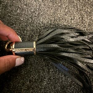 Michael kors tassel accessory